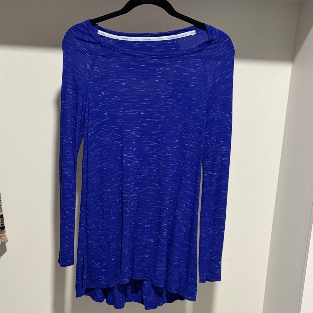 Calvin Klein Performance Royal Blue Long Sleeve scalloped shirt tail. Size Small
